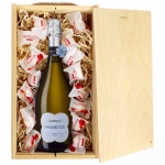 Białe wino musujące Prosecco Abbazia z pralinami Raffaello